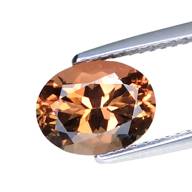 1.76cts Orange brown scapolite oval cut loose gemstones "see video"